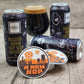 A New Hop beer sticker featuring a sci-fi inspired hop design, shown on waterproof vinyl