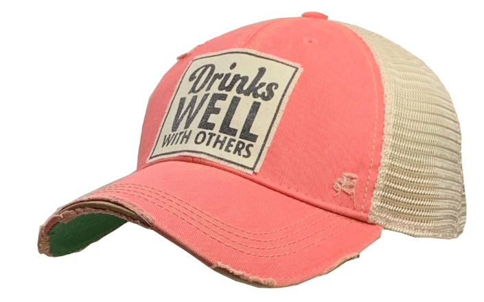 Vintage Distressed Trucker Cap - "Drinks Well with Others" - Pink These distressed beer hats are incredibly comfortable.  Most trucker caps are rigid, but these vintage unstructured caps are made of a cotton/polyester blend with a soft mesh back that makes them fit more like a "Dad Hat." Now in Canada.